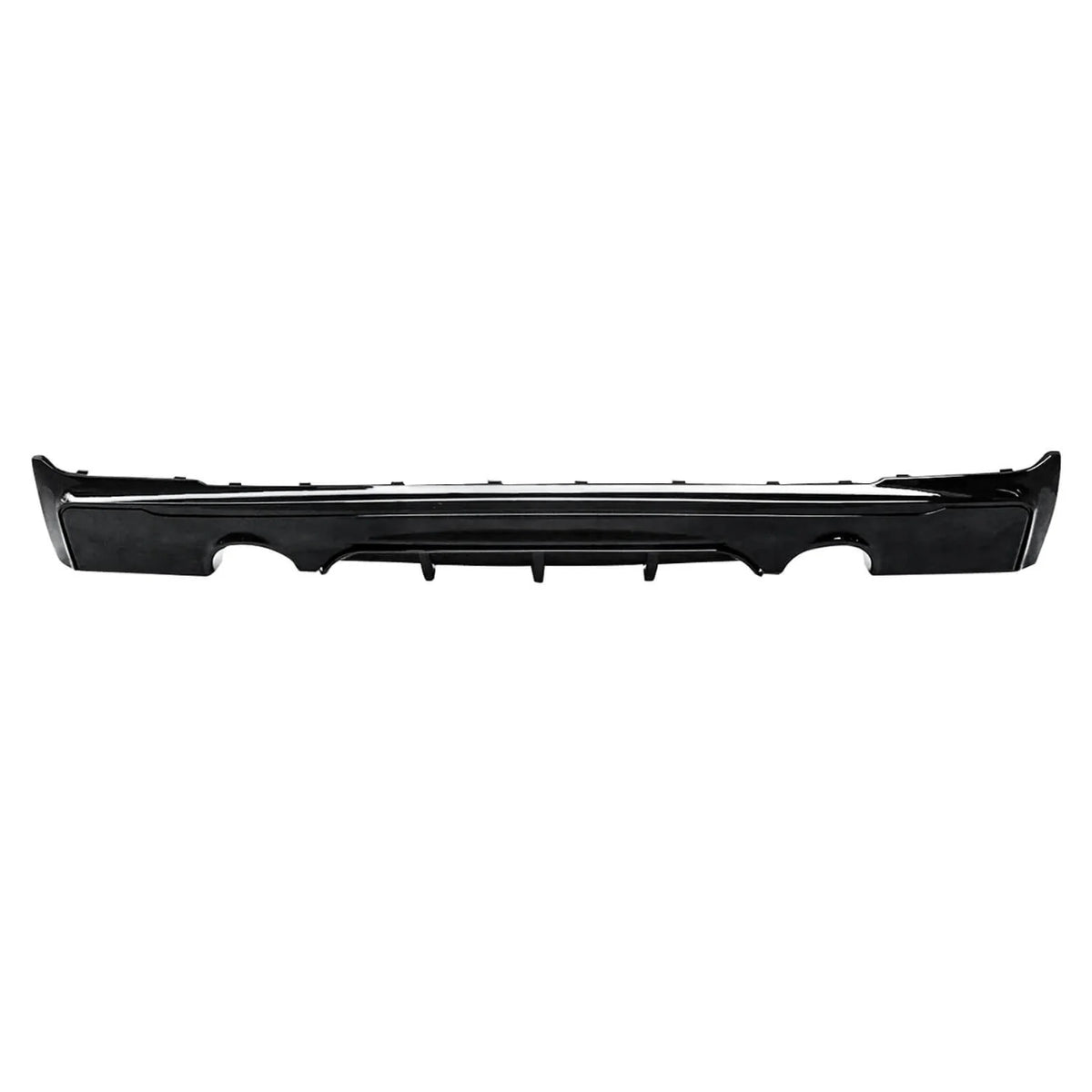A sleek black car bumper with aerodynamic grooves shown against a white background, highlighting its streamlined design. The bumper has cutouts and contours, suggesting modern styling.