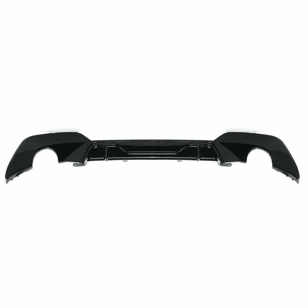 A black car bumper diffuser lies flat against a white background, showcasing cutouts for exhaust pipes and a sleek, aerodynamic design.