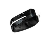 A black plastic car side mirror cover is angled, exposing interior clips and attachment points, against a plain white background.