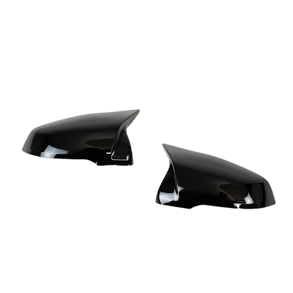 Two glossy black car side mirror covers, angled towards each other, are isolated on a white background. They are designed to fit over existing mirrors, offering a sleek, aerodynamic appearance.
