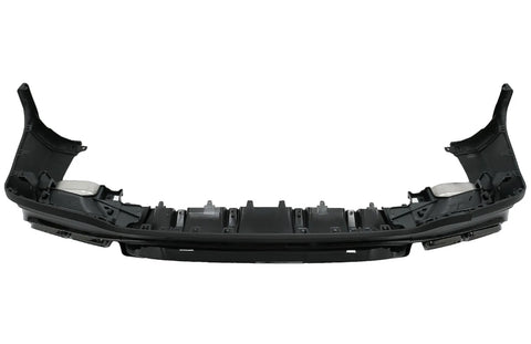 A black plastic car bumper, featuring mounting brackets and slots, is positioned in an isolated, white background setting.