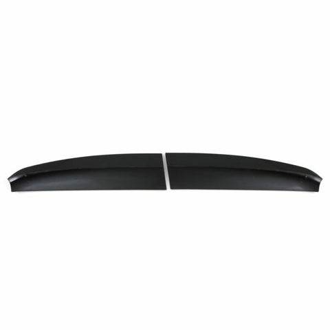 Two black, elongated spoiler pieces lie side by side, separated by a small gap, against a plain white background.