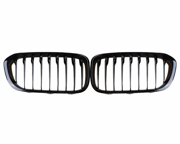 A pair of black, horizontally aligned kidney-shaped car grilles with vertical slats, set against a plain white background.