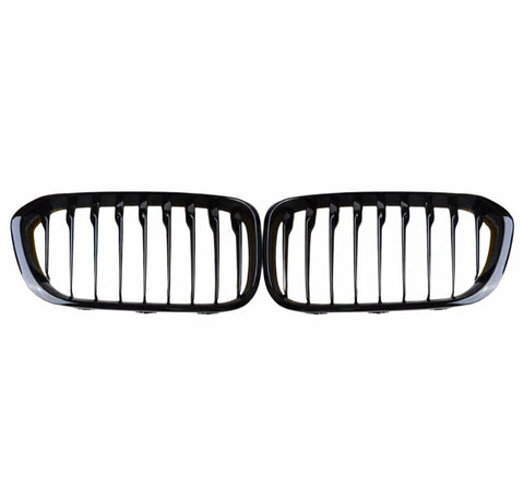 A pair of black, horizontally aligned kidney-shaped car grilles with vertical slats, set against a plain white background.