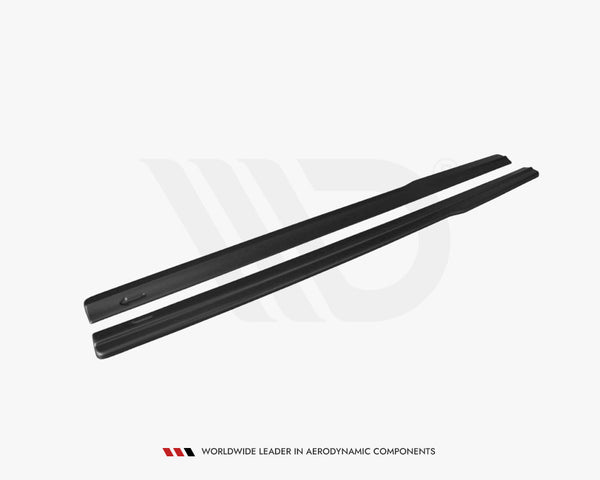Two black aerodynamic vehicle components lie parallel on a white surface. Text below reads, "WORLDWIDE LEADER IN AERODYNAMIC COMPONENTS."