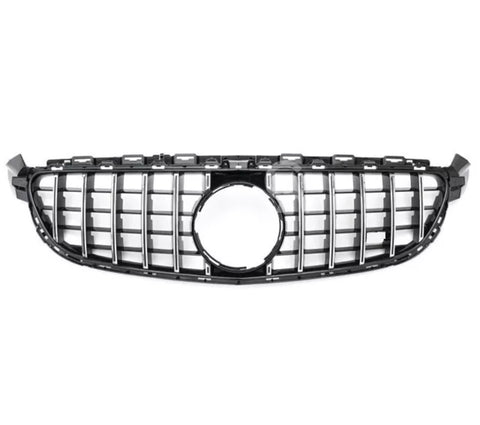 Car grille with vertical chrome slats and a central circular emblem space; displayed against a plain white background.