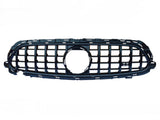 A black plastic car grille with a honeycomb pattern and an emblem cutout rests against a plain white background.