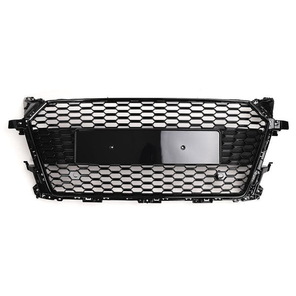 A black honeycomb-patterned car grille is displayed on a white background. It features a central rectangular area for a license plate or emblem.