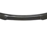 Carbon fiber car spoiler resting on a plain white background, showcasing its sleek, curved design and glossy texture, highlighting the material’s distinctive woven pattern.