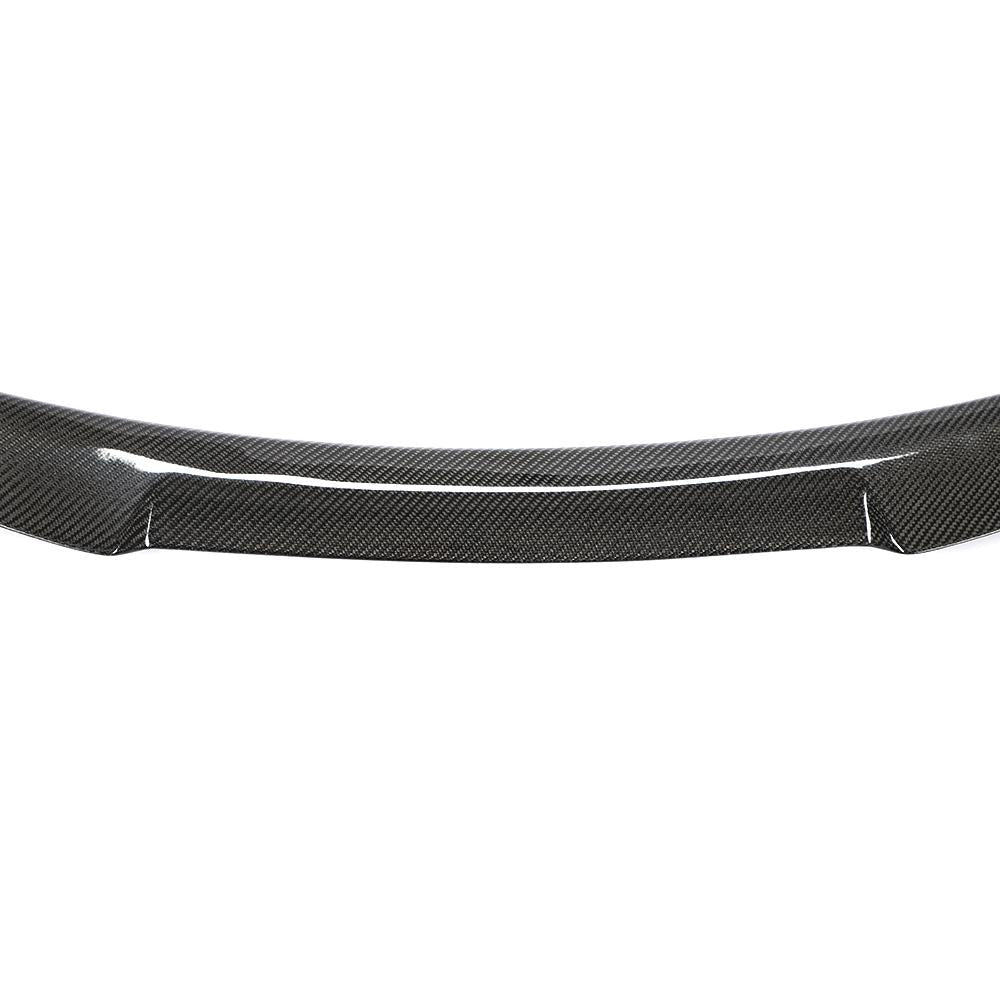 Carbon fiber car spoiler resting on a plain white background, showcasing its sleek, curved design and glossy texture, highlighting the material’s distinctive woven pattern.