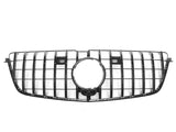 A black car grille features a series of vertical and horizontal bars with a large circular space in the center. It is set against a plain white background.