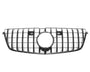 A black car grille features a series of vertical and horizontal bars with a large circular space in the center. It is set against a plain white background.