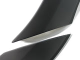 Two sleek, black, curved objects with pointed ends overlap slightly, set against a plain white background.