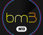 Text "bm3" in gradient yellow to orange with a "N13" label below, encircled by blue and red rings, on a dark background.