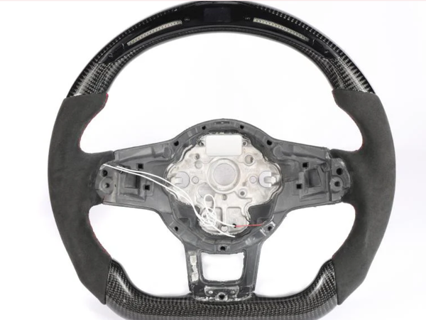 Steering wheel without the central cover, featuring carbon fiber details and exposed wires, set against a plain white background.