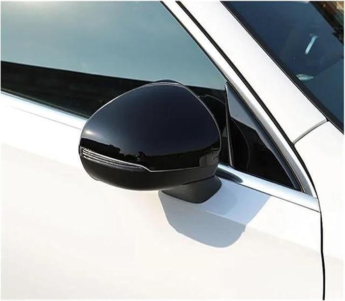 A black side mirror is attached to a white car, reflecting light in a sunny outdoor setting. The vehicle's window and frame are partially visible.