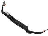 A black car front splitter lies on a white background. It features a glossy finish and has aerodynamic curves at the edges for performance enhancement.