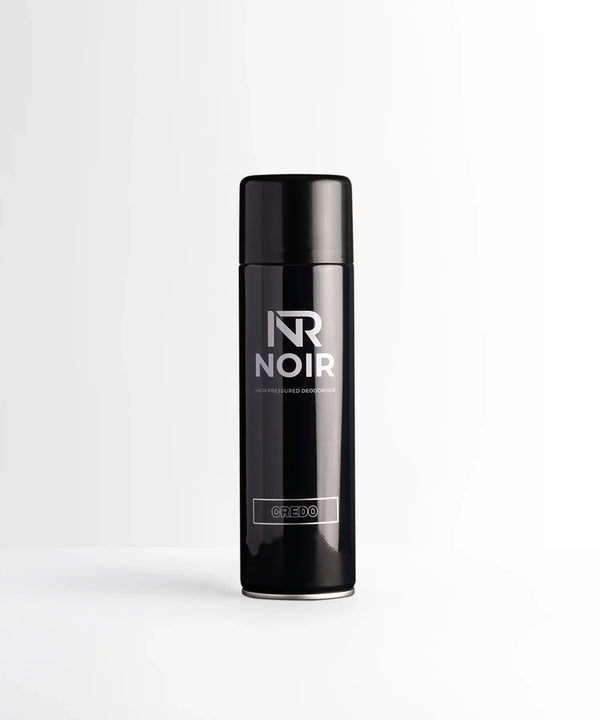 A black deodorant spray can labeled "NR NOIR HIGH PRESSURED DEODORISER CREDO" stands upright against a plain white background.