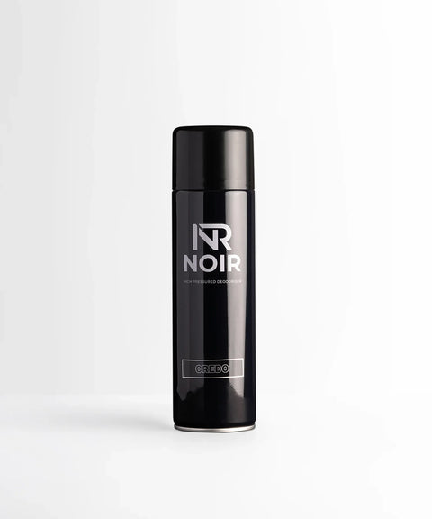 A black deodorant spray can labeled "NR NOIR HIGH PRESSURED DEODORISER CREDO" stands upright against a plain white background.
