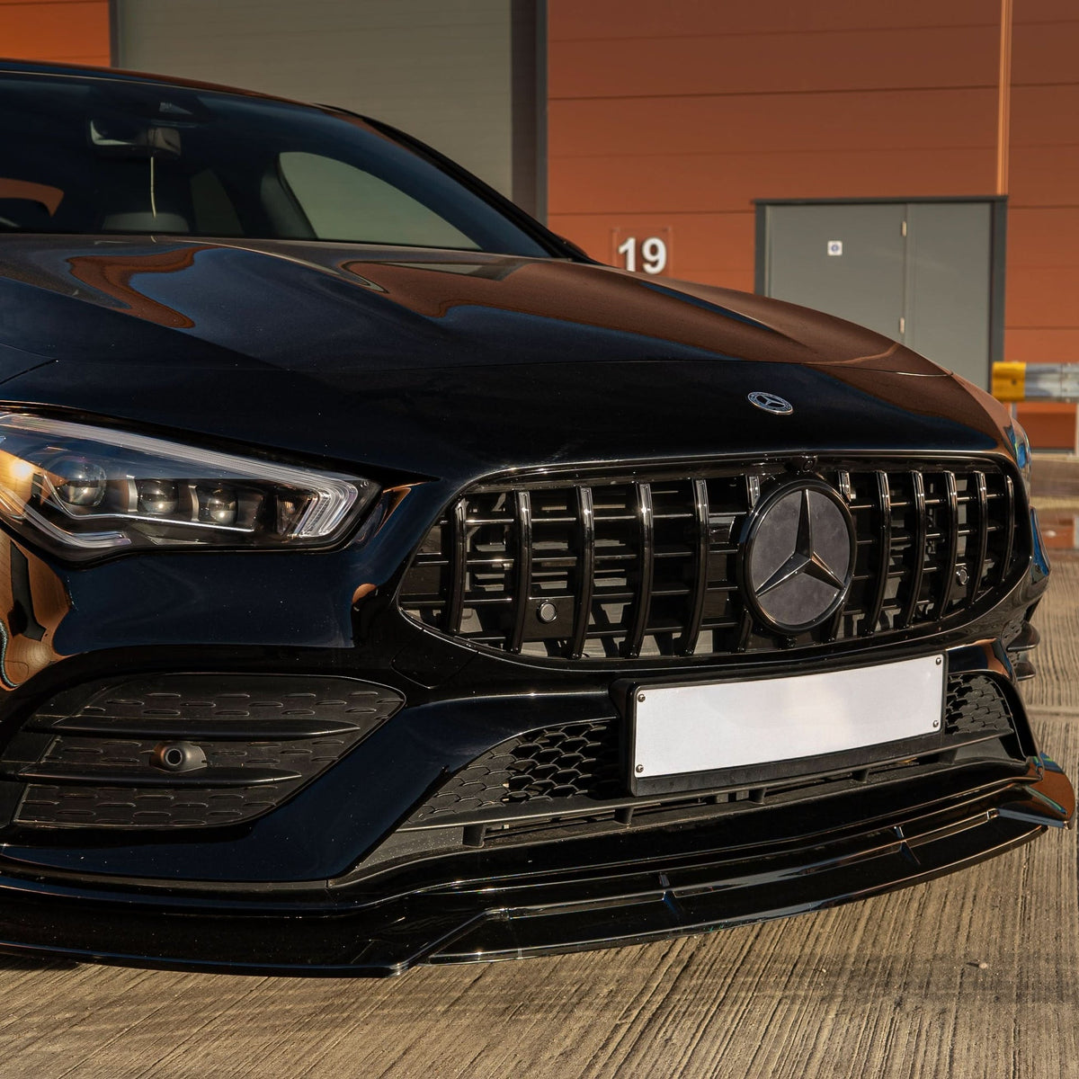 CLA - W118 Pre-Facelift: Gloss Black V2 Style Front Splitter 19-23
