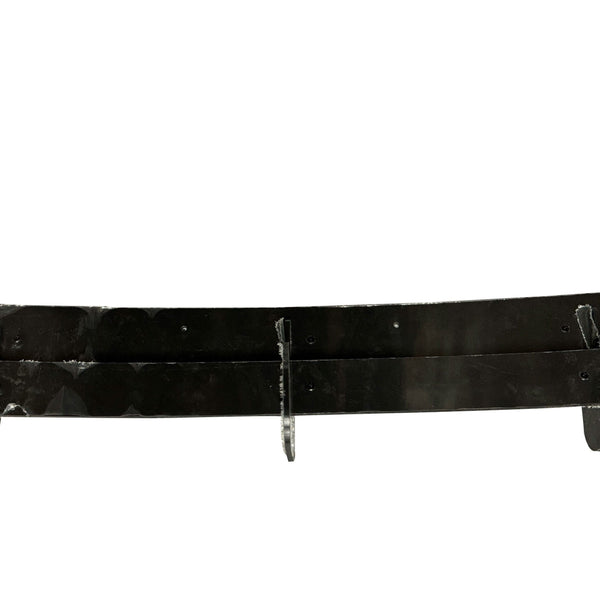A black, elongated object with three attached hooks is resting horizontally. The shiny surface and rectangular shape suggest it could be a type of holder or mounting device. The background is plain white.