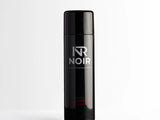 A black aerosol can labeled “NR NOIR” and “HIGH PRESSURED DEODORISER” stands upright on a plain white surface. The word “ROUGE” is in red near the base.