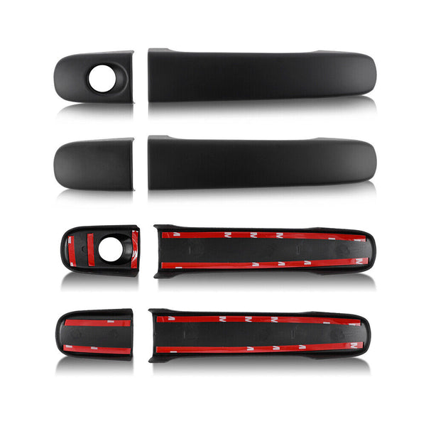 Matte black door handle covers with adhesive strips are aligned horizontally; the bottom covers show red adhesive backing. They're meant for attachment to vehicle doors in an automotive context.