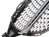 A car grille features a hexagonal pattern with silver accents and a glossy black frame, designed for vehicle front-end styling and ventilation on a plain white background.