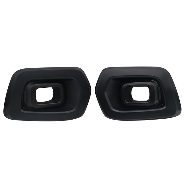 Two black exhaust tips with rectangular openings are facing forward. They are placed side by side against a plain white background.