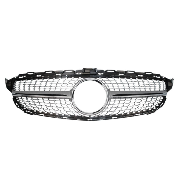 A chrome and black car grille with a honeycomb pattern features a circular emblem space in the center, set against a plain white background.