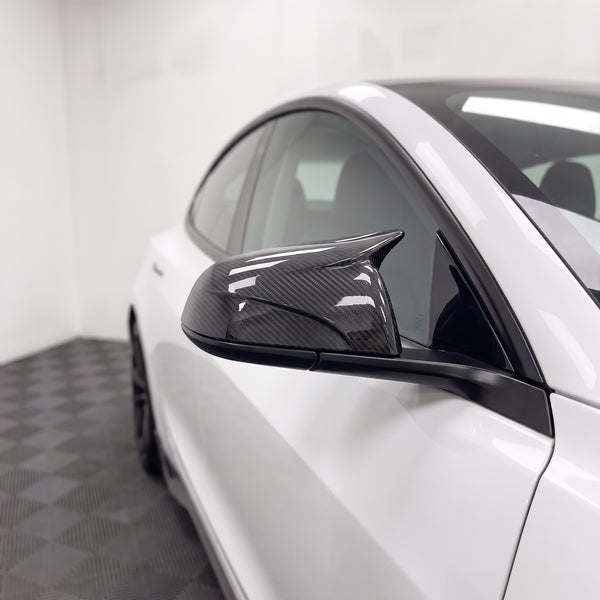 Close-up of Carbon Fibre Look M Style Wing Mirror Cover fitted to a Tesla Model 3 | Carbon Accents