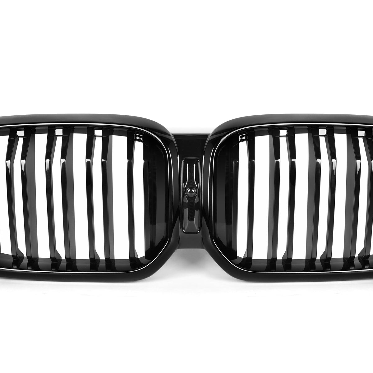 A black, dual kidney-shaped car grille with vertical slats is centered against a white background, highlighting its glossy finish and symmetrical design.