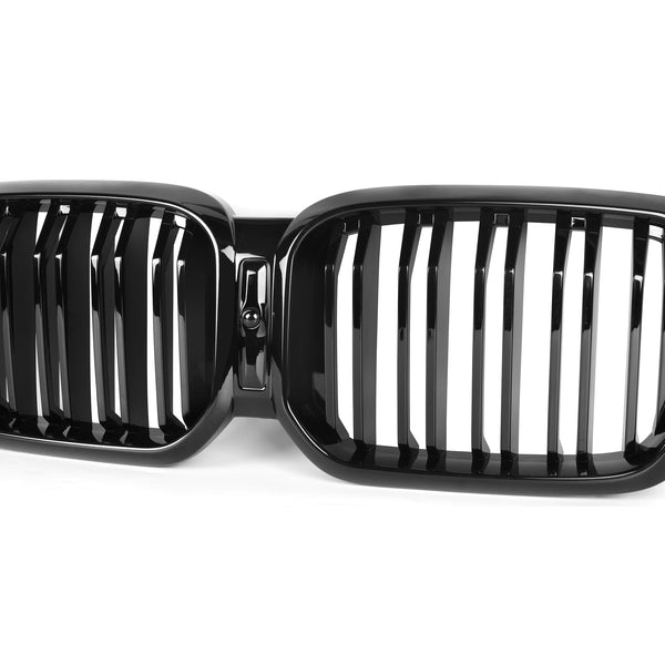 A black dual-kidney car grille with vertical slats, set against a plain white background, resembling typical front-end automotive design elements.