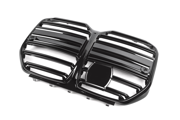 A glossy black automobile grille with horizontal slats, featuring two side-by-side sections and a central emblem space, is positioned against a plain white background.