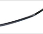 A sleek, curved carbon fiber spoiler lies on a plain white background. The spoiler's glossy surface reflects light, highlighting its aerodynamic design.