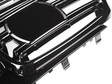 A shiny, black car grille with horizontal slats is positioned at an angle, possibly for a vehicle's front. It is isolated against a white background.