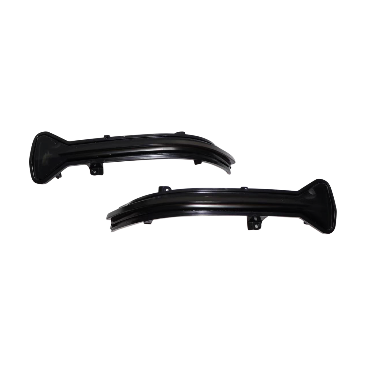 Two curved black plastic car parts lay side by side on a white background, each featuring a broad base and a tapered end, likely designed for mounting on a vehicle.