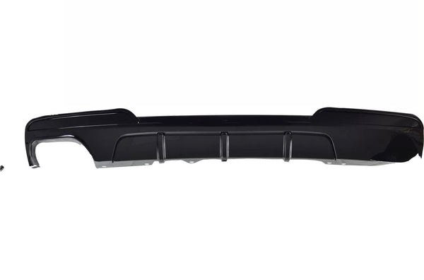 A black car bumper, featuring vertical slits for airflow, is displayed against a plain white background.