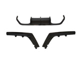 Three black automotive body parts are laid out separately against a white background, comprising a central diffuser and two angled side skirts.