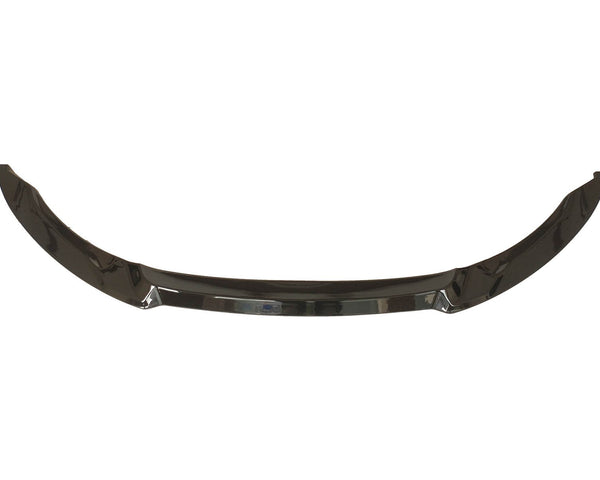 A sleek, curved car bumper lip, resting against a white background, featuring a glossy black finish.