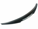 A curved black car bumper spoiler sits isolated against a plain white background, designed to enhance vehicle aerodynamics.
