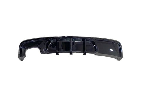 A glossy black car rear diffuser featuring vertical fins is displayed against a plain white background.
