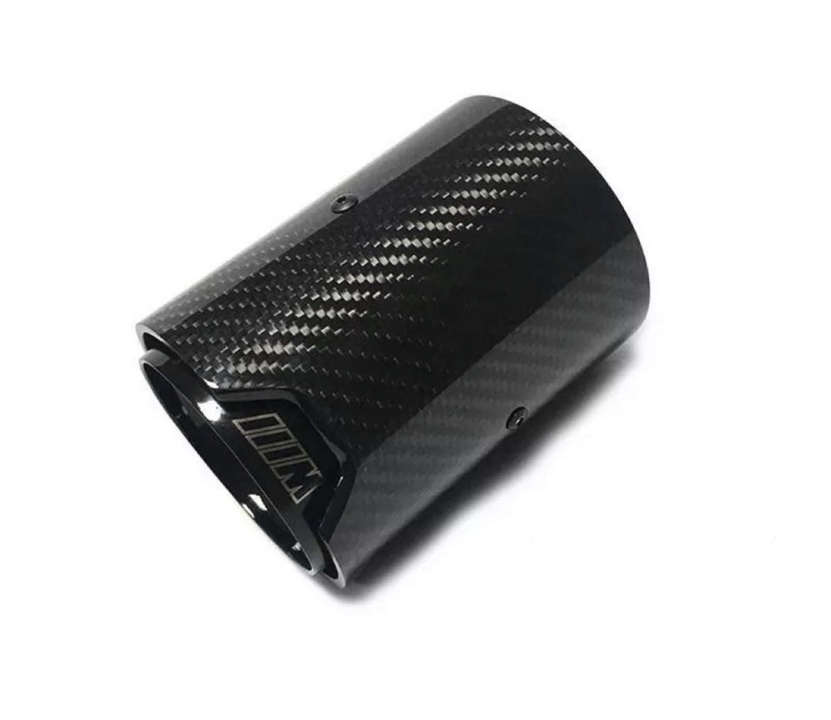 A carbon fiber exhaust tip lies angled on a white background, featuring a glossy checkered pattern with the letter "M" visible near the opening.
