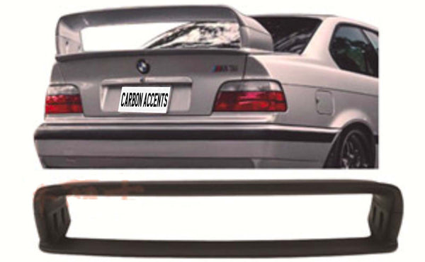 A silver car's rear with a large spoiler and "CARBON ACCENTS" text on the license plate. Below, a detached black car part is displayed in front of a white backdrop.