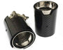 Two carbon fiber exhaust tips with a metallic interior, one upright, the other lying down showing adjustable clamps. Both feature a "W" insignia. Set against a plain white background.