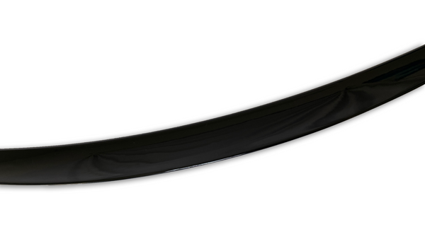 A glossy black curved object, possibly a part of a larger structure, bends gracefully against a plain white background.