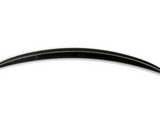 Curved black blade with a pointed tip, positioned horizontally on a plain white background. Its sleek, smooth surface is unadorned except for subtle markings along the edge.