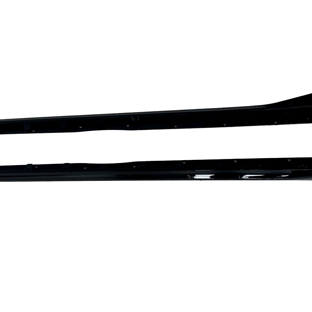 Two long, black vehicle side skirts are positioned horizontally on a white background, each displaying a sleek, aerodynamic design with smooth, glossy surfaces.