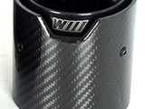 A carbon fiber exhaust tip is placed vertically on a white background. The tip features a shiny black interior and the text 