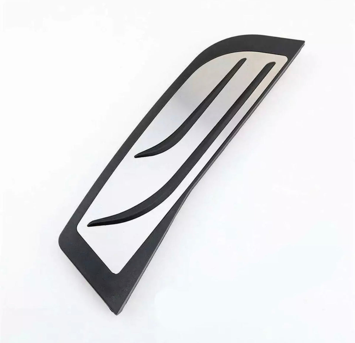 A sleek, curved, metallic car accessory with two slits rests on a plain white background, designed for aerodynamic enhancement.